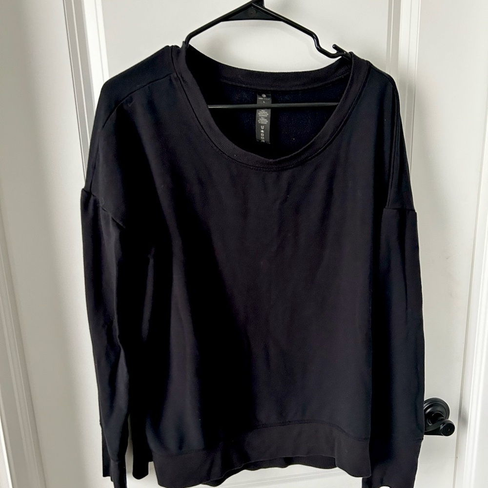 Yogalicious oversized sweatshirt with slits on the side.